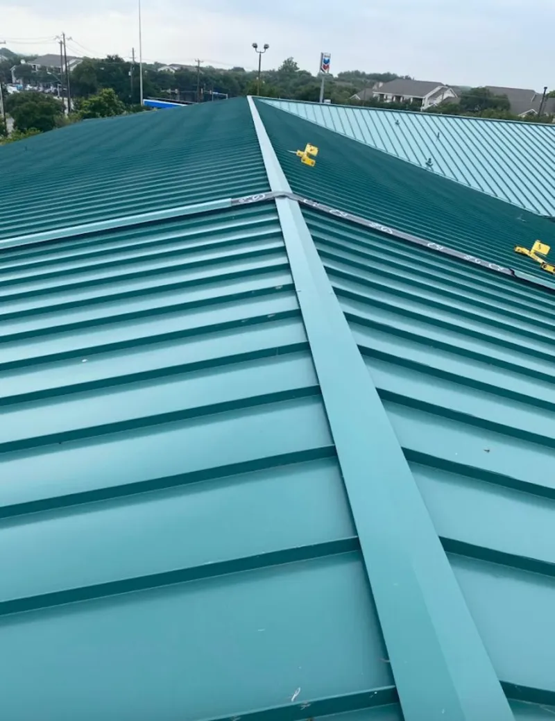 Green commercial metal roof ridge and valley for Metal Roof Repair in Fulton